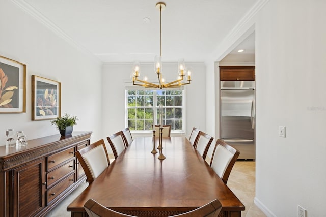 dining room with crown molding, baseboards, and a chandelier