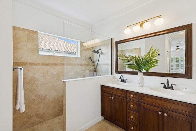 full bath with double vanity, a sink, crown molding, and a walk in shower