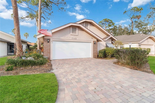 view of front of home with a garage