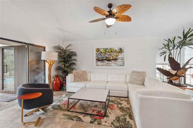 living room with vaulted ceiling and ceiling fan