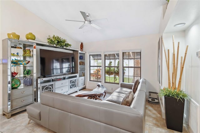 tiled living room with vaulted ceiling and ceiling fan