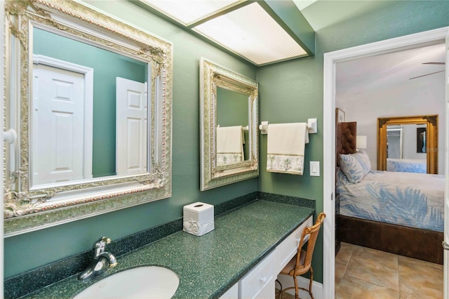 bathroom featuring tile patterned floors and vanity