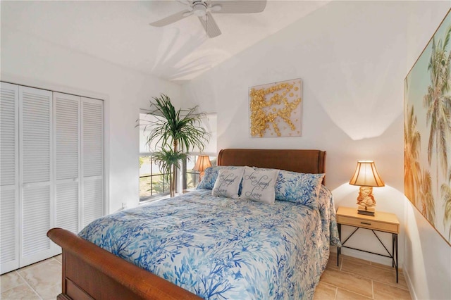 tiled bedroom featuring ceiling fan and a closet