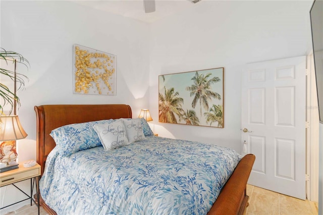 bedroom featuring light tile patterned floors and ceiling fan