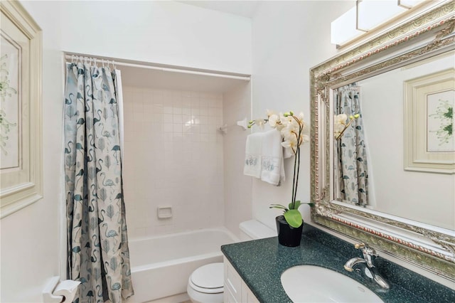 full bathroom with shower / tub combo with curtain, vanity, and toilet