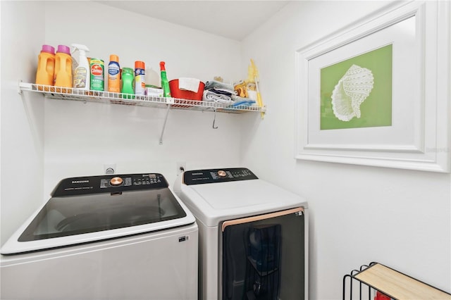 laundry room with separate washer and dryer