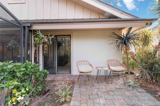 property entrance with a patio area