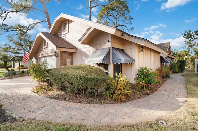 view of home's exterior featuring a garage