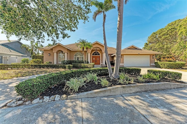 single story home with a garage