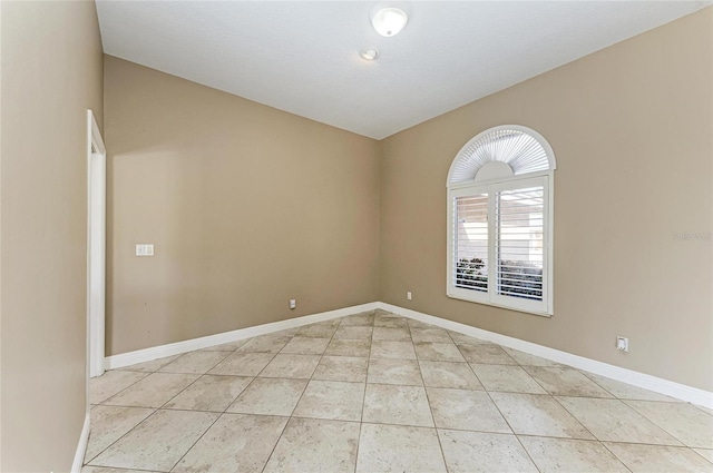 view of tiled spare room