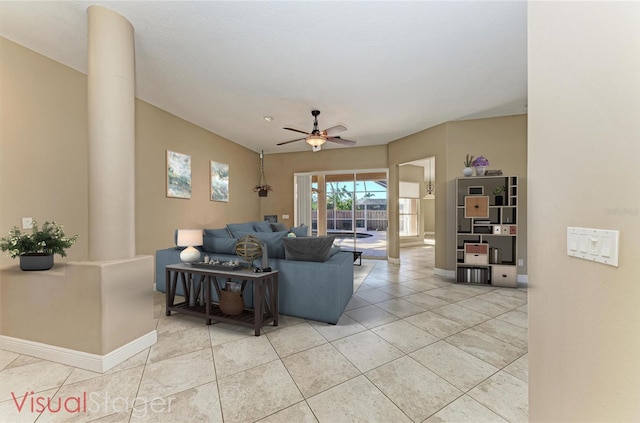 living room with light tile patterned floors and ceiling fan