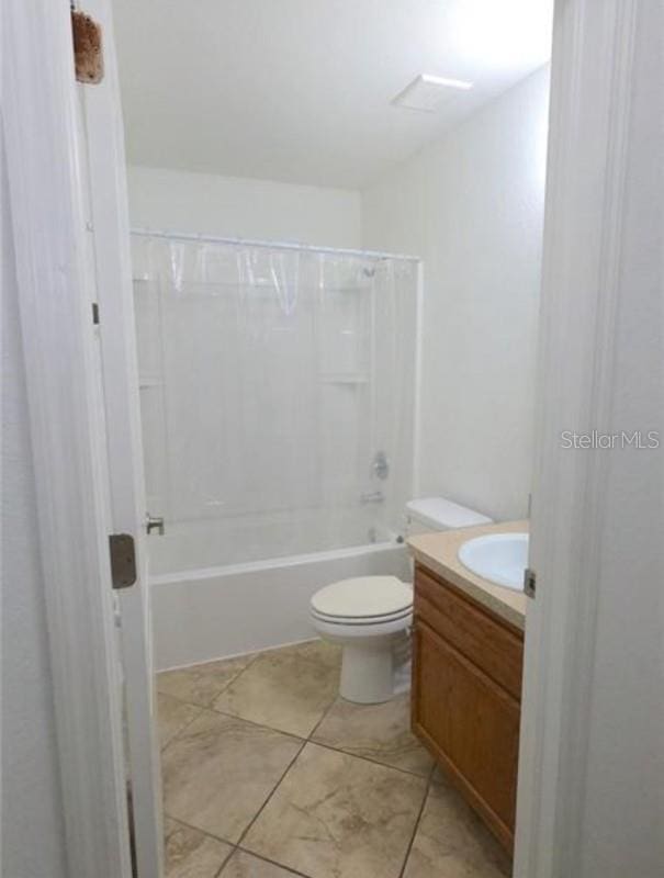 full bathroom with toilet, tile patterned flooring, bathtub / shower combination, and vanity