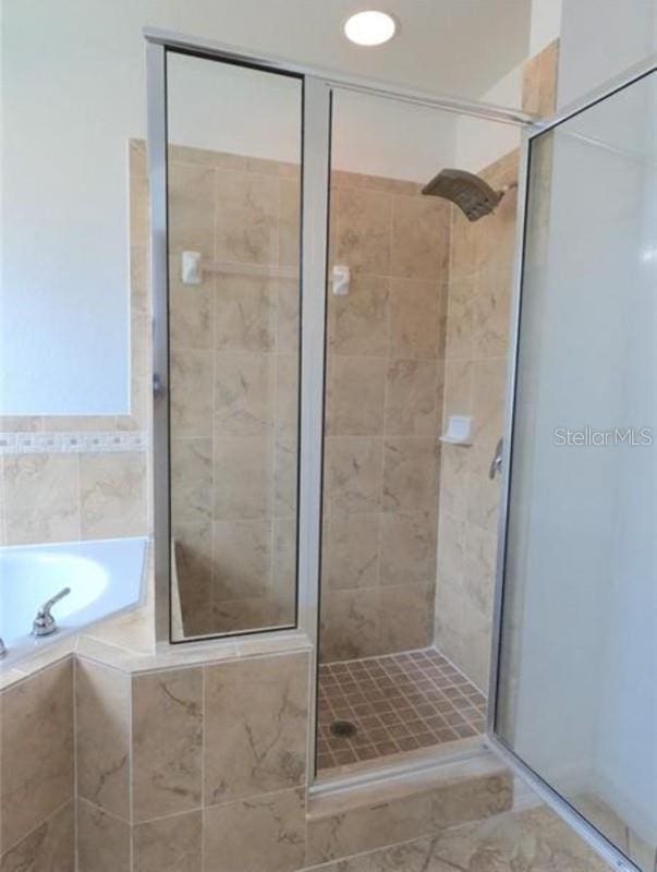 bathroom with plus walk in shower