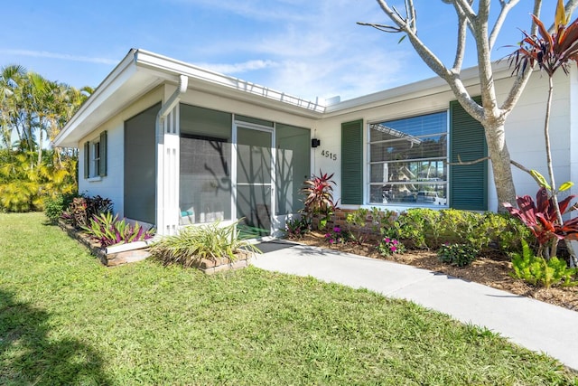 exterior space featuring a lawn