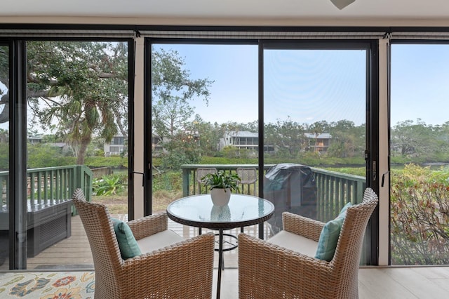 sunroom / solarium featuring a wealth of natural light