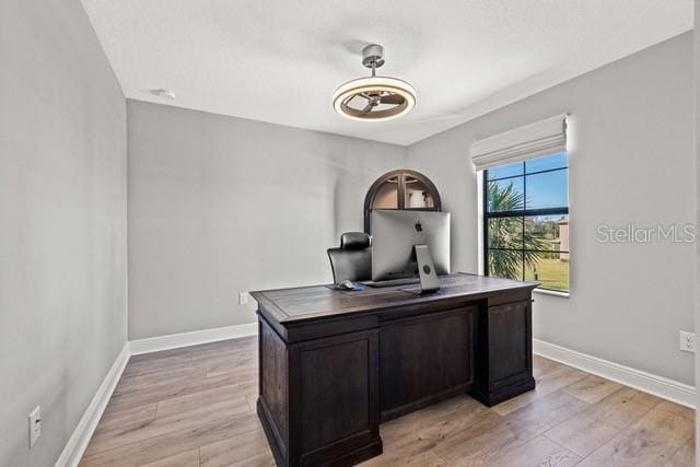 home office featuring light wood-type flooring