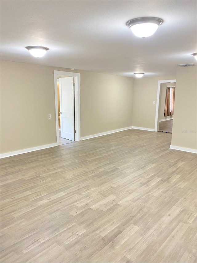 basement with light wood-type flooring