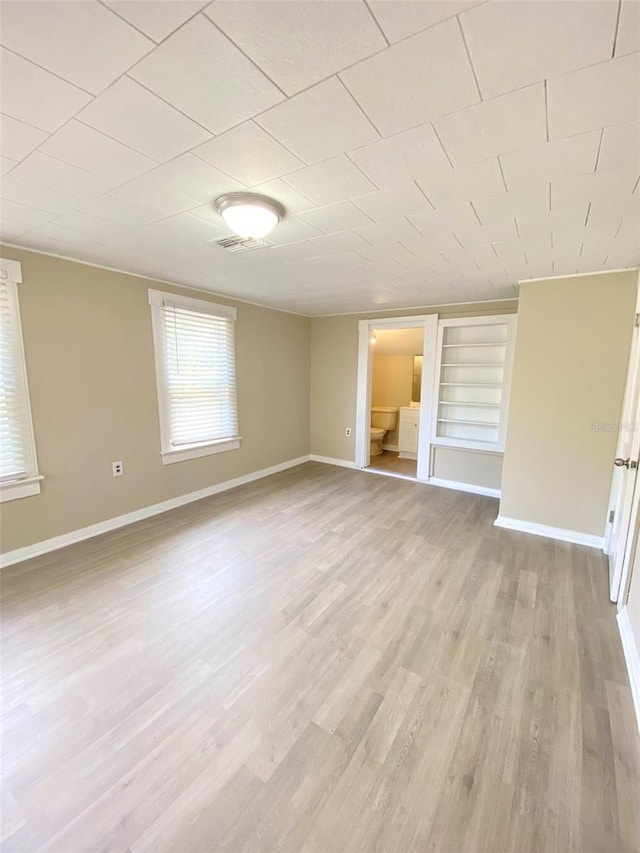 unfurnished bedroom with light hardwood / wood-style floors