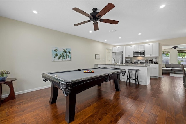 rec room with ceiling fan, dark hardwood / wood-style flooring, and pool table