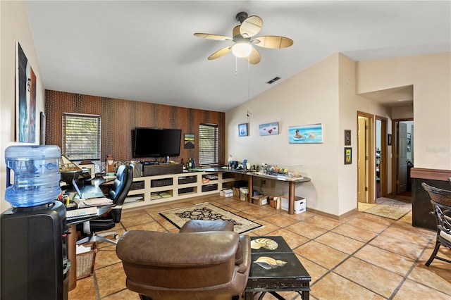 tiled living room featuring vaulted ceiling and ceiling fan