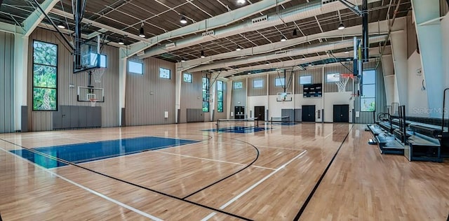 view of sport court featuring plenty of natural light and community basketball court