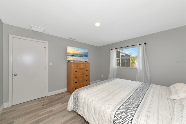 bedroom featuring light wood-type flooring