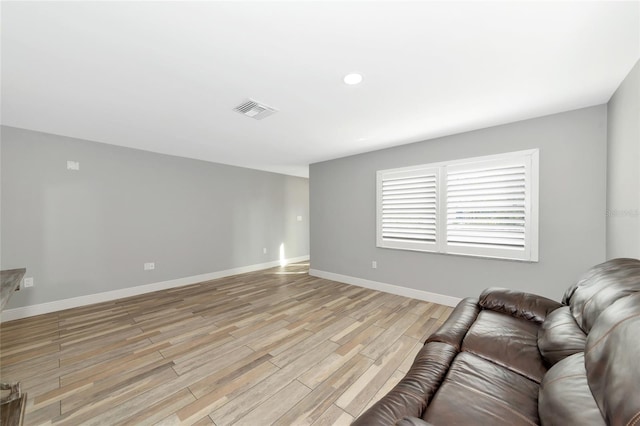 unfurnished living room with light wood-type flooring