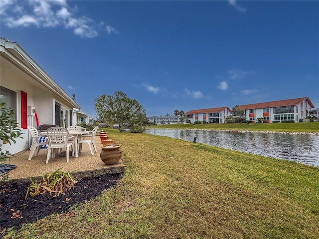 view of yard with a water view