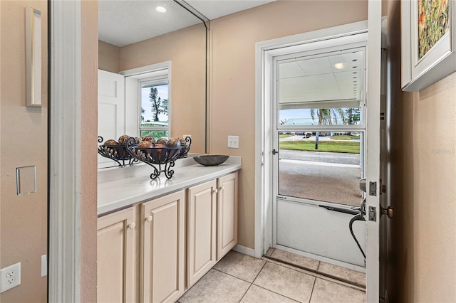 bathroom featuring tile patterned floors and vanity