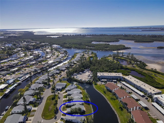 bird's eye view featuring a residential view and a water view