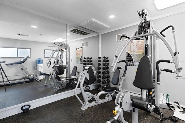 workout area with a textured ceiling