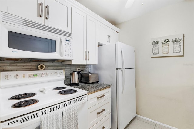 kitchen with ceiling fan, backsplash, white cabinets, light tile patterned flooring, and white appliances