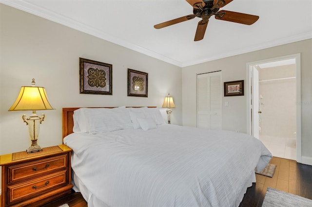 bedroom featuring crown molding, ceiling fan, hardwood / wood-style flooring, connected bathroom, and a closet