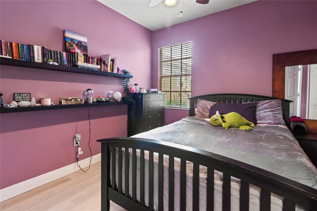 bedroom featuring light hardwood / wood-style flooring and ceiling fan