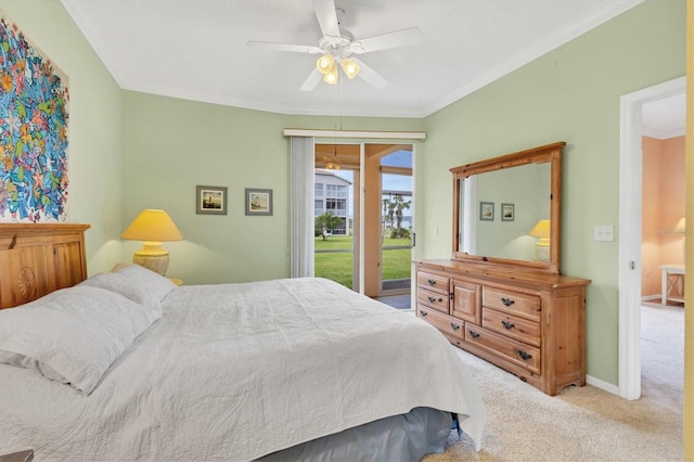 carpeted bedroom featuring access to exterior, ornamental molding, and ceiling fan