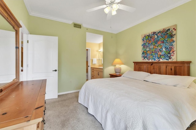 carpeted bedroom with crown molding, connected bathroom, and ceiling fan