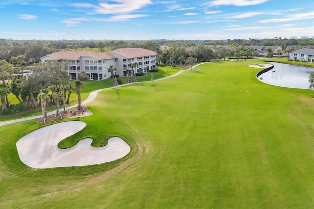 surrounding community with a water view