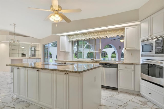 kitchen featuring white cabinetry, appliances with stainless steel finishes, and sink