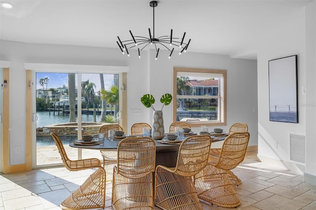 dining area with a water view