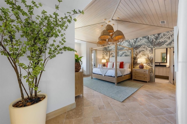 bedroom with wood ceiling and vaulted ceiling