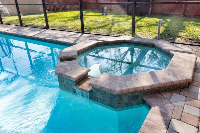 view of pool featuring an in ground hot tub and glass enclosure