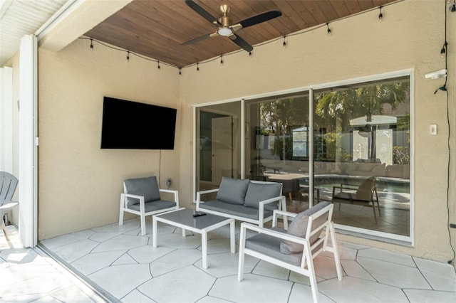 view of patio featuring outdoor lounge area and ceiling fan