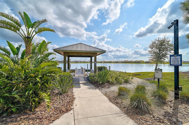 view of community featuring a water view and a gazebo