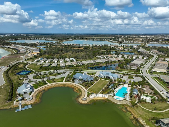 bird's eye view with a water view and a residential view