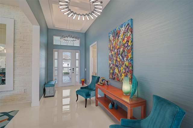 8261 Grande Shores Dr, Sarasota, FL 34240 - living area with tile patterned flooring and a towering ceiling