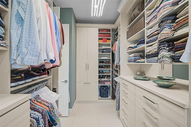 8261 Grande Shores Dr, Sarasota, FL 34240 - spacious closet with light tile patterned flooring