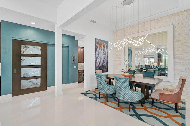 8261 Grande Shores Dr, Sarasota, FL 34240 - dining space with tile patterned floors and baseboards