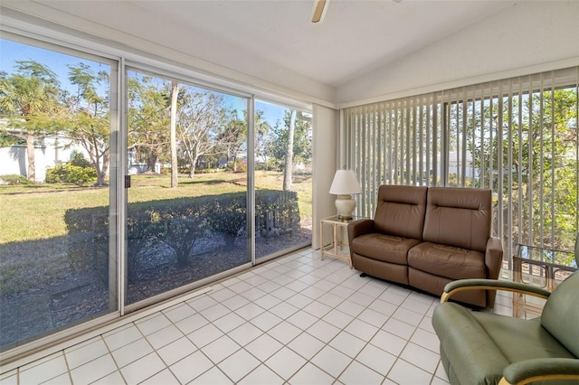 unfurnished sunroom featuring vaulted ceiling and ceiling fan