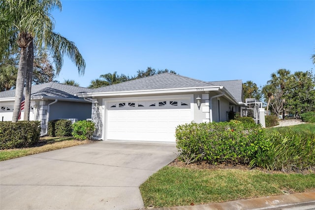 single story home with a garage