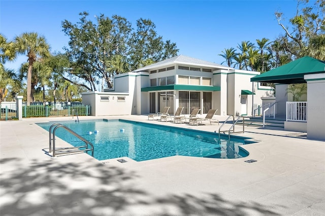 view of swimming pool featuring a patio